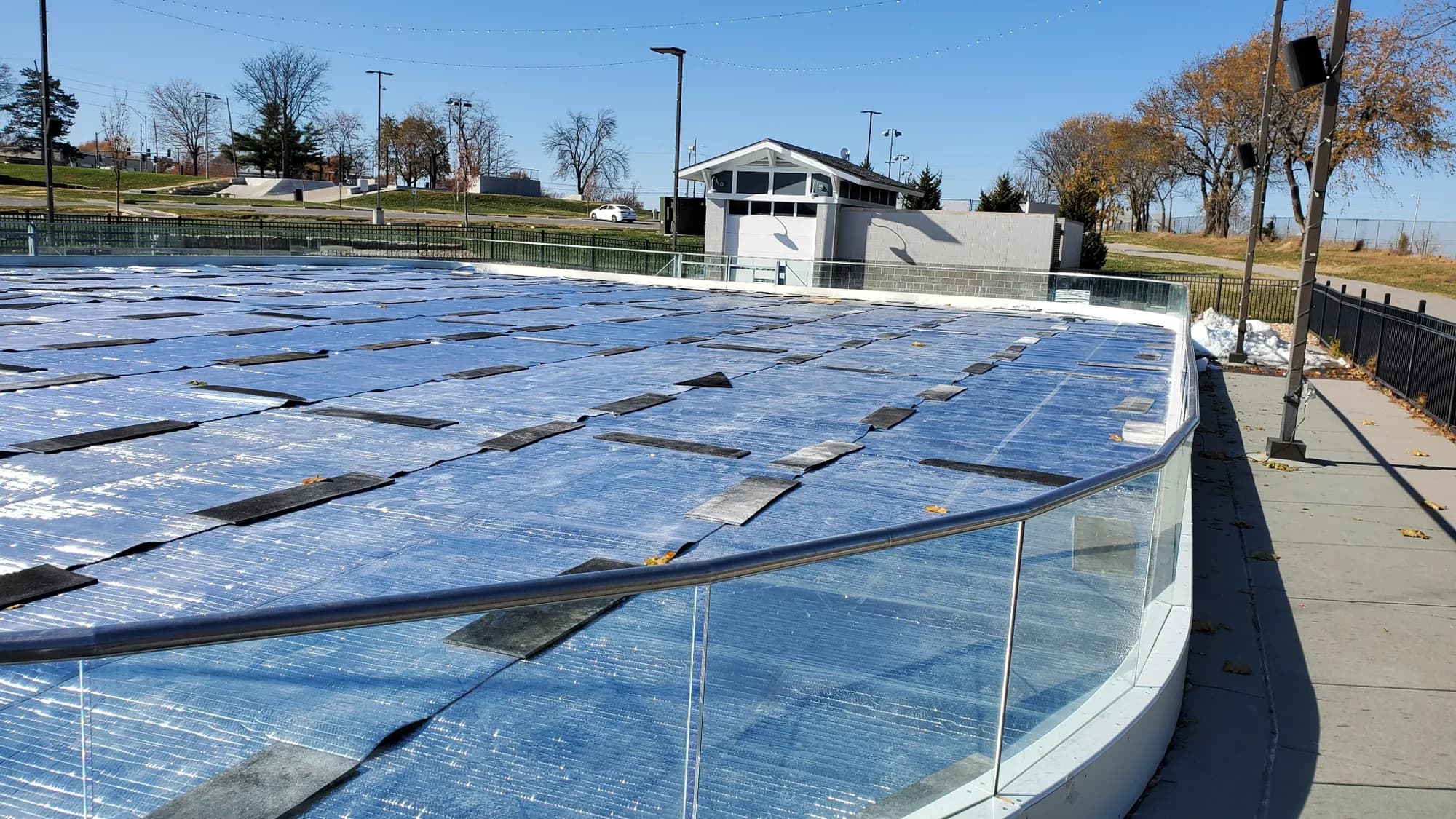Reflective Ice Protection Blanket providing full rink coverage during sunny weather
