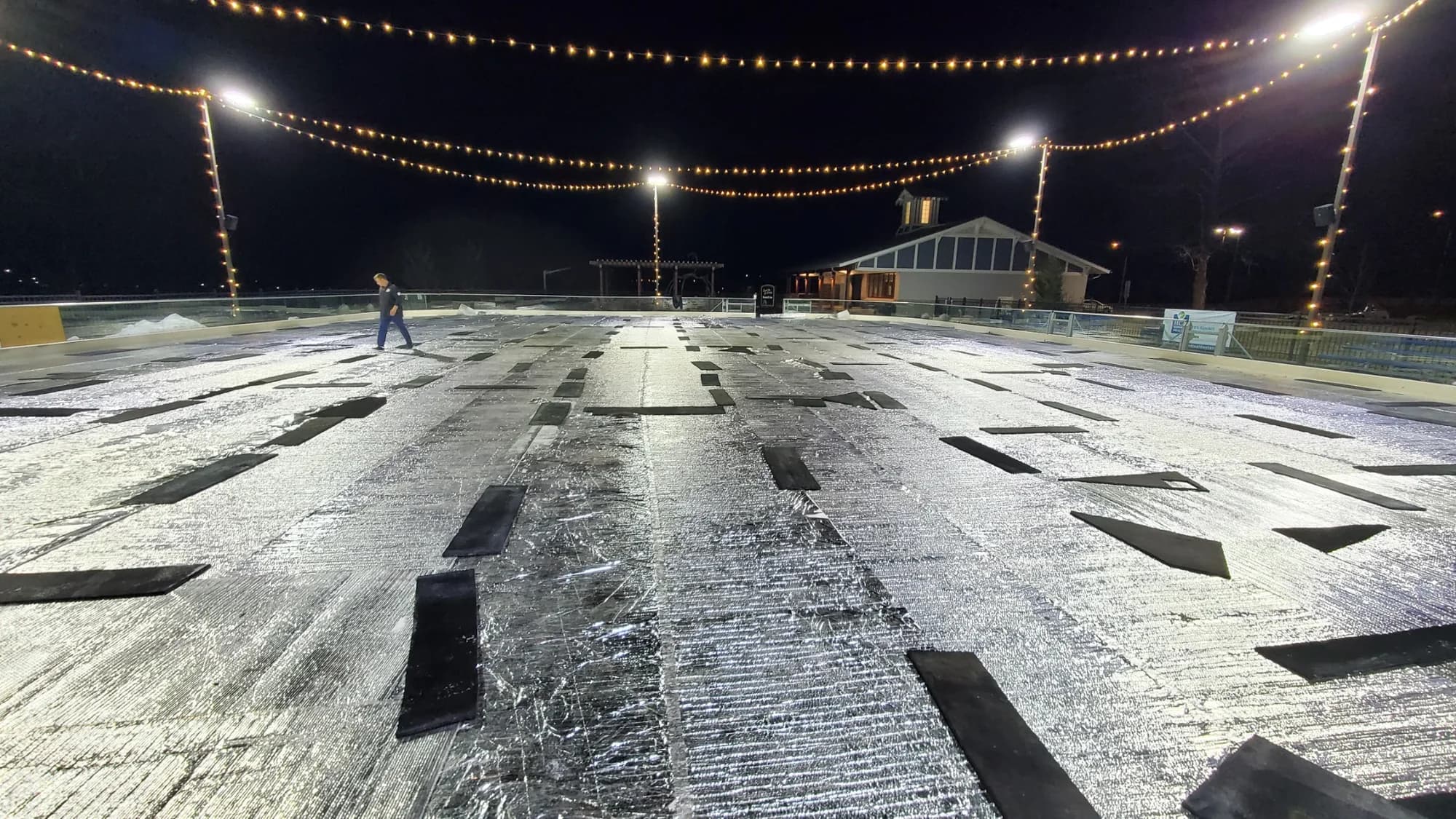 Ice Protection Blanket deployed across an outdoor rink at night